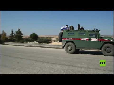 شاهدالقوات الروسية تسير دورياتها على الطريق السريع m5
